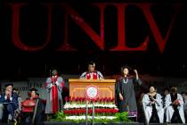 Postgraduates George William Kajjumba, left, and Fawn Douglas, right, are recognized by UNLV pr ...