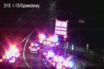 A heavy police presence on Interstate 15 northbound behind a semi-truck at the Speedway exit ab ...