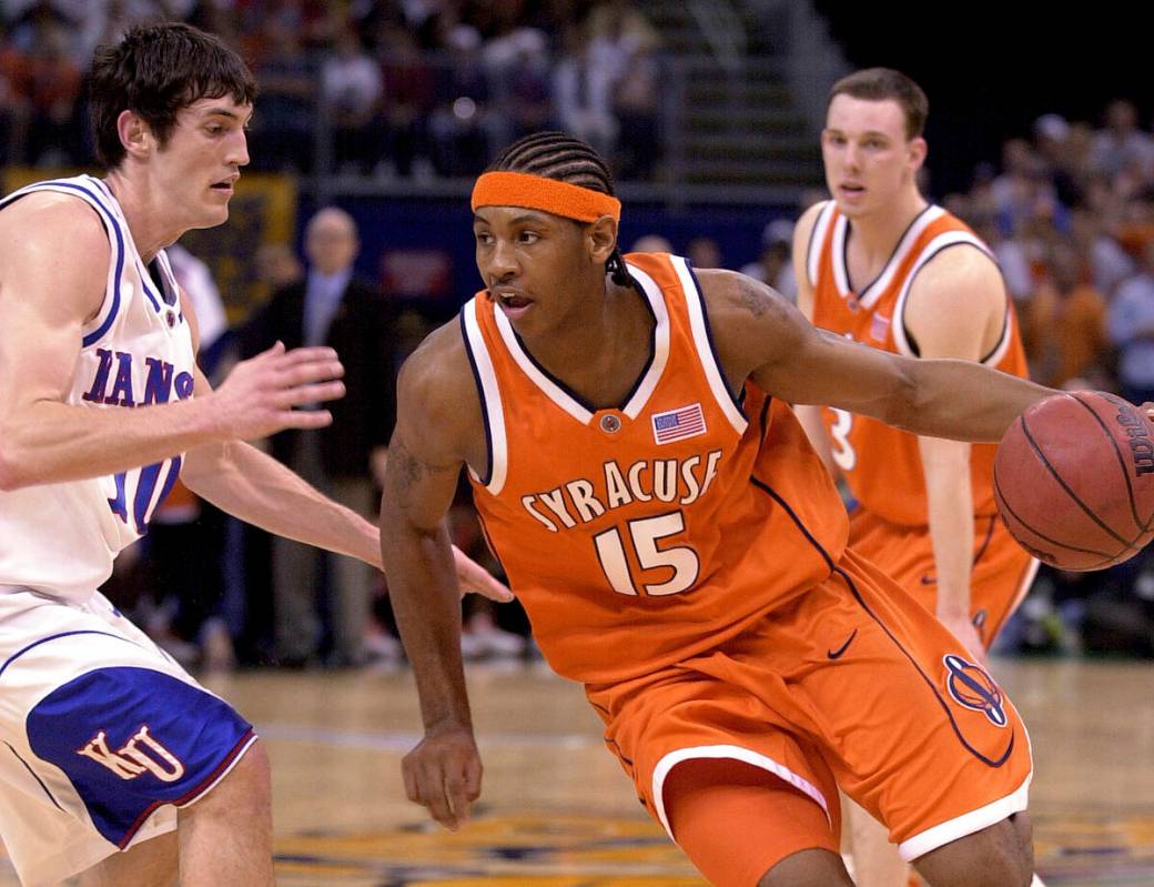 Syracuse's Carmelo Anthony (15) drives with Kansas' Kirk Hinrich (10) defending in the first ha ...