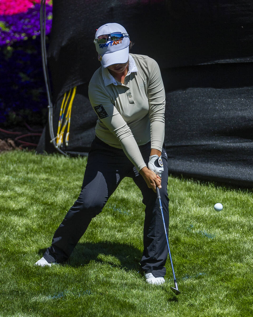 Sei Young Kim wedges out of the rough of the 18th green during the first day of the LPGA T-Mobi ...