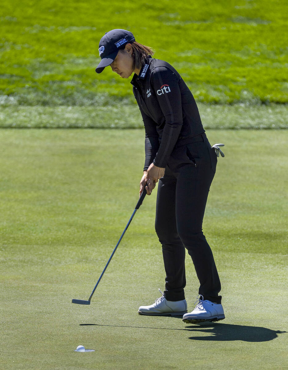 Danielle Kang putts the ball in at the 7th hole during the first day of the LPGA T-Mobile Match ...