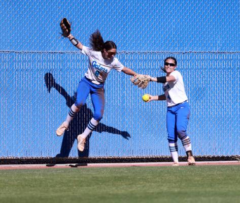 Green Valley’s Lyla Baxter (9) celebrates a catch by Kalina Carrizales (4) against Bisho ...