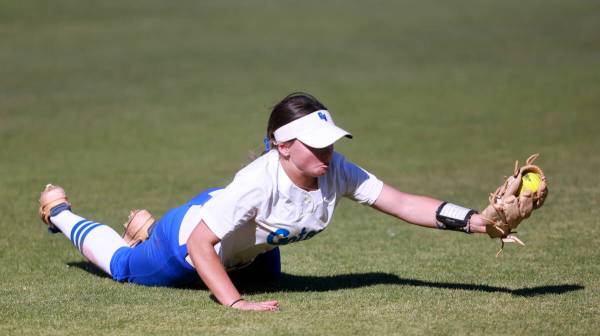 Green Valley left fielder Lauryn Galvin (3) makes a diving catch against Bishop Gorman in the s ...