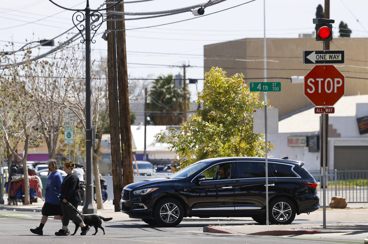 Pedestrians cross Garces avenue where street signals recently added at the intersections of Gar ...