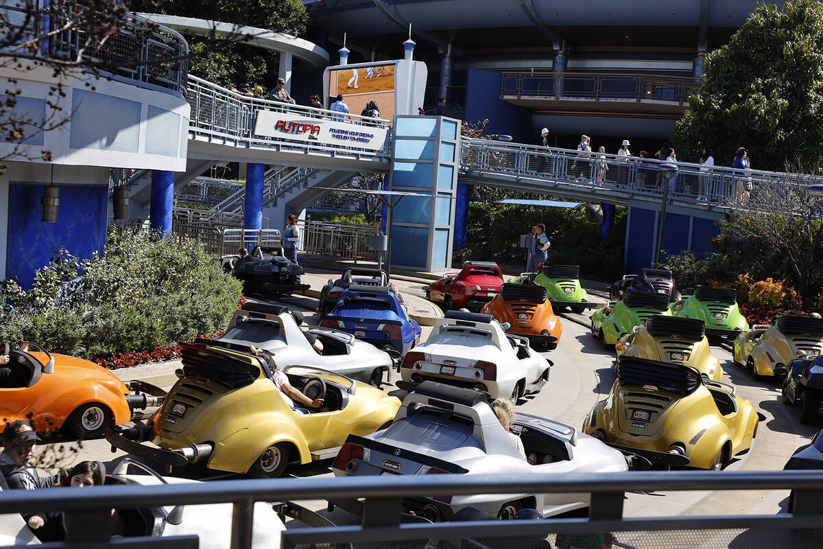 Cars get stuck in traffic as they near the exit to Autopia in Disneyland. (Allen J. Schaben/Los ...