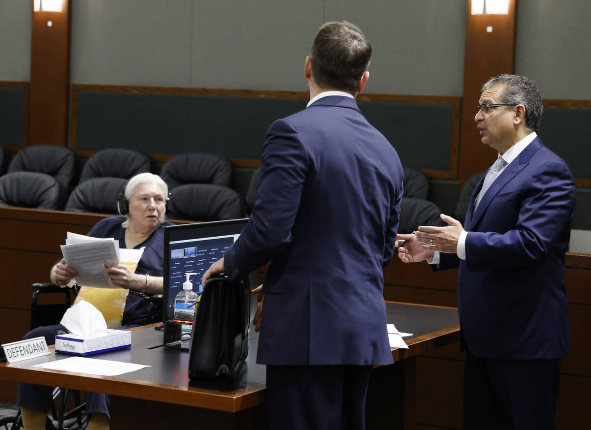 Defense attorney Christopher Oram, right, addresses the court as Thomas Randolph, left, who was ...