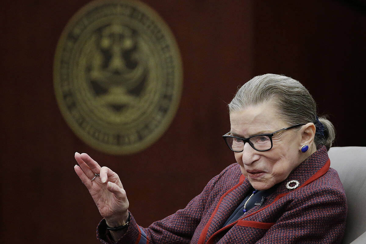 Supreme Court Justice Ruth Bader Ginsburg answers a law student's question as she participates ...