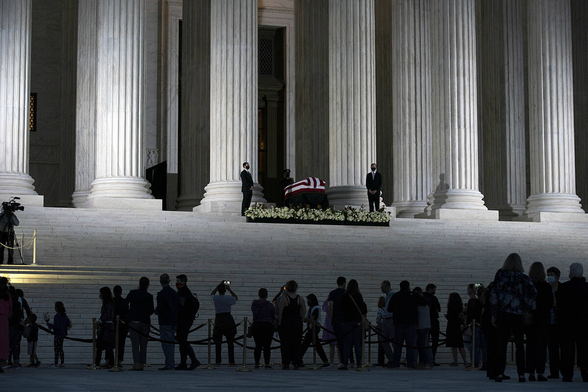 Mourners pay respects as Justice Ruth Bader Ginsburg lies in repose under the Portico at the to ...