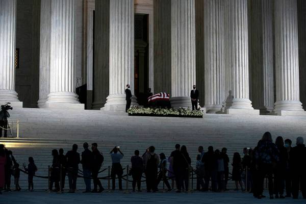 Mourners pay respects as Justice Ruth Bader Ginsburg lies in repose under the Portico at the to ...