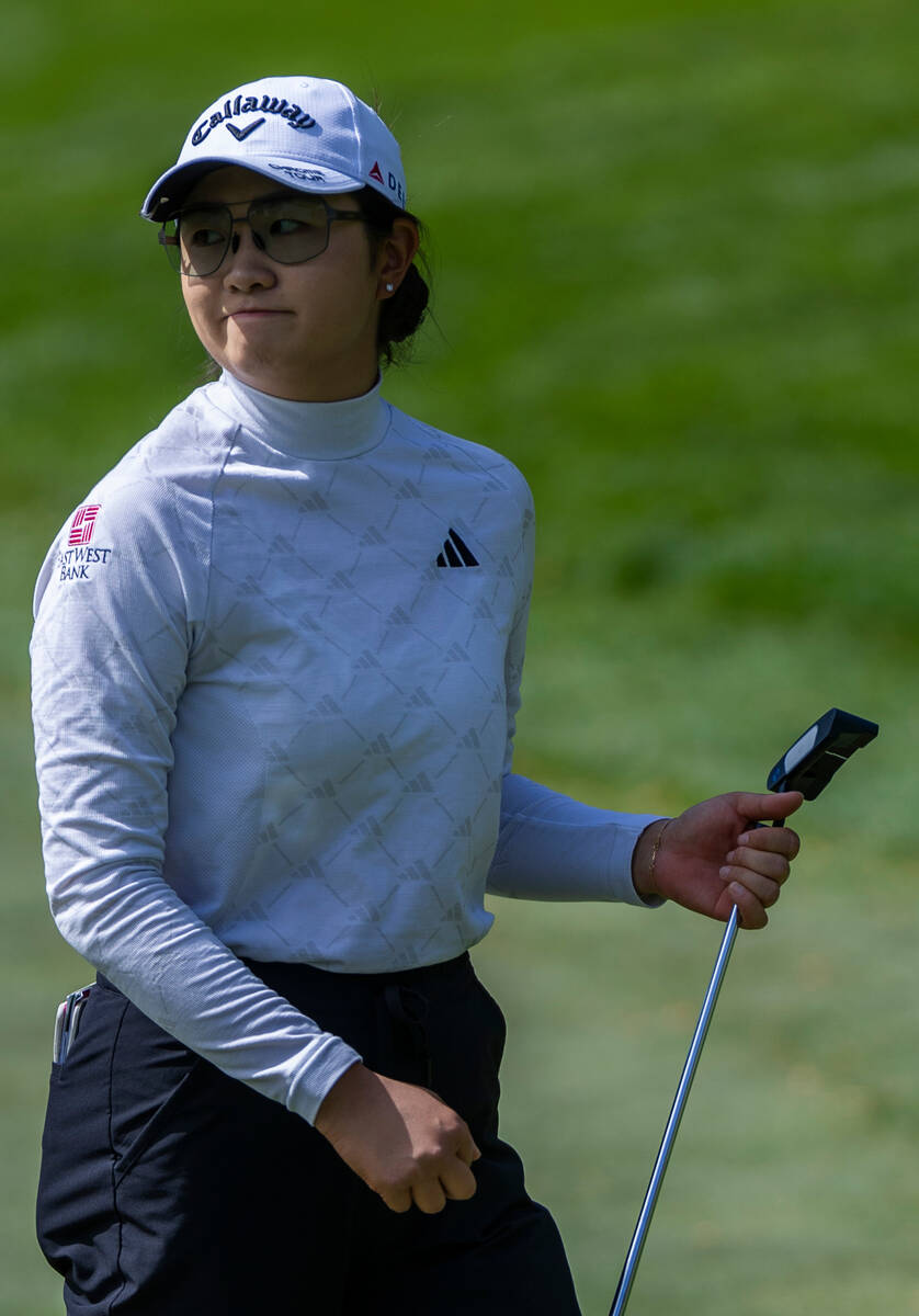 Rose Zhang is pleased with her putt on hole #8 during the second day of the LPGA T-Mobile Match ...