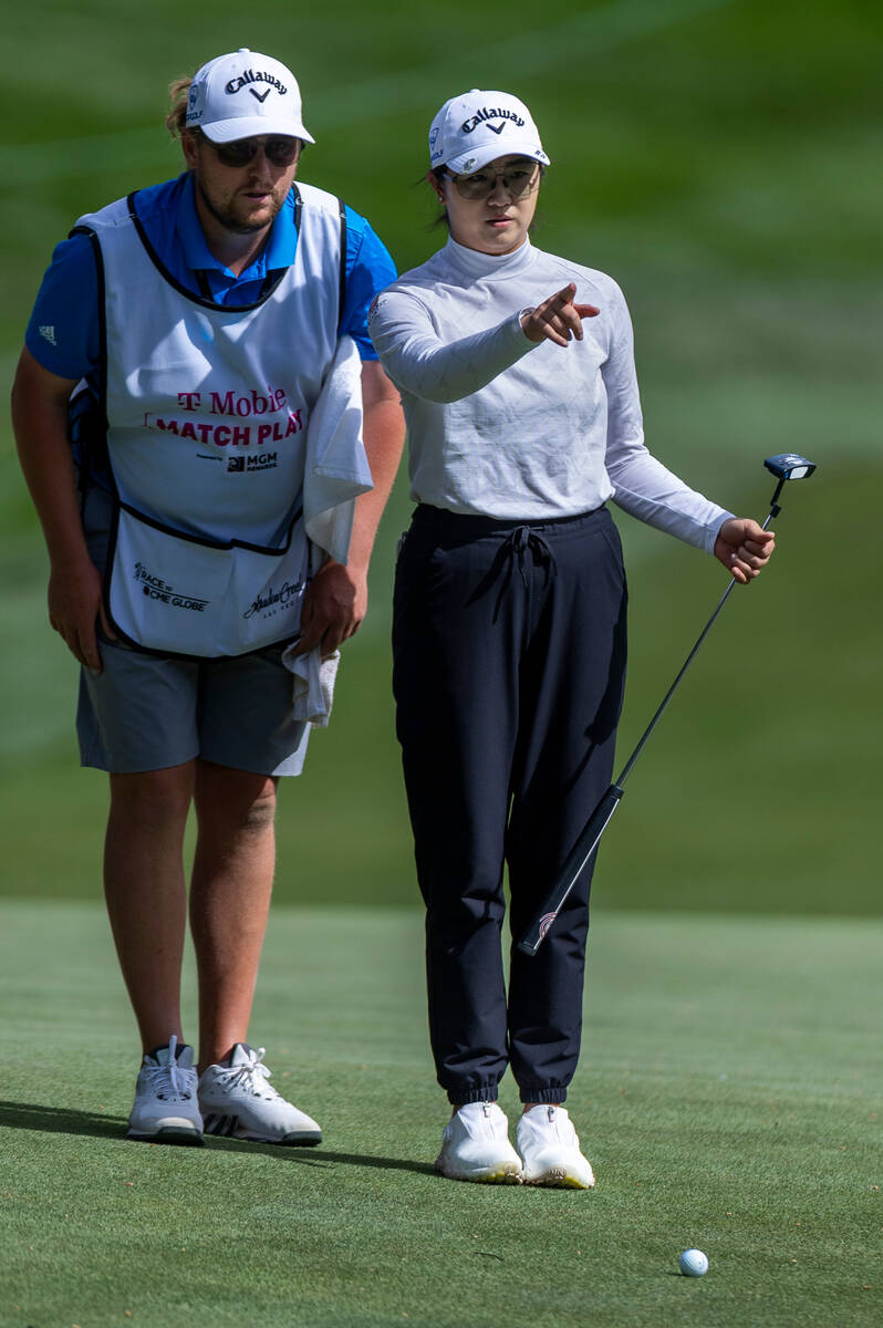 Rose Zhang, right, confers with caddie Brett Olly on hole #9 during the second day of the LPGA ...