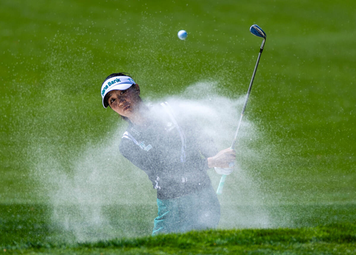 Lydia Ko blasts out of a sand trap on hole #7 during the second day of the LPGA T-Mobile Match ...