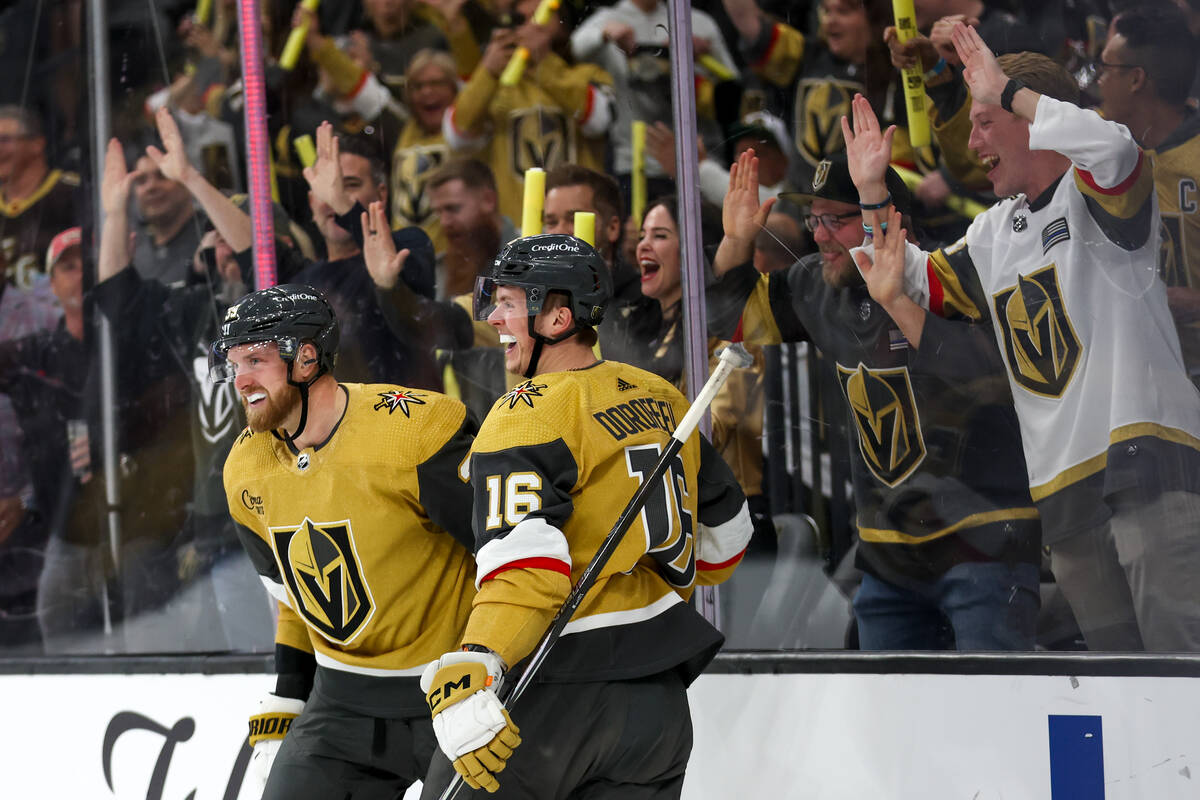 Golden Knights right wing Anthony Mantha (39) and left wing Pavel Dorofeyev (16) celebrate afte ...