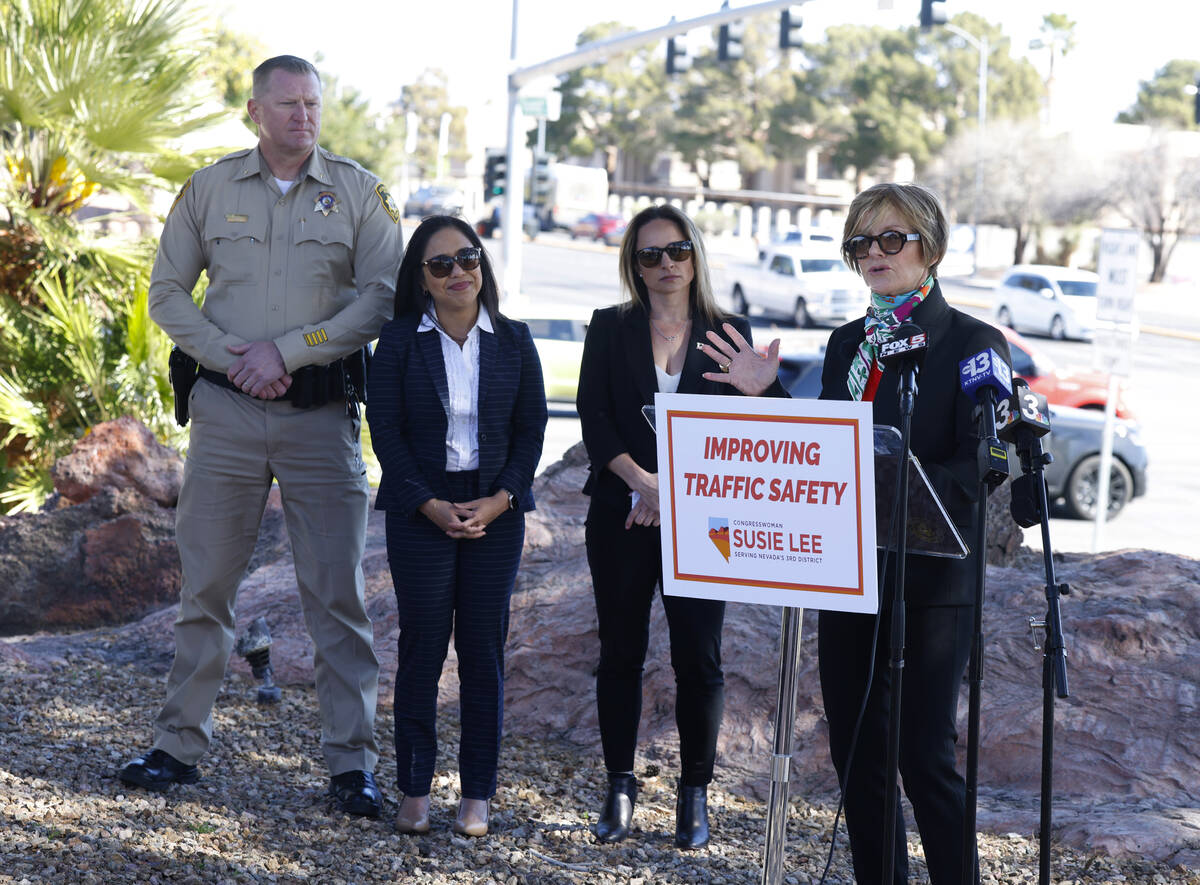 Rep. Susie Lee, D-Nev., right, speaks during a news conference to announce a more than $3.3 mi ...