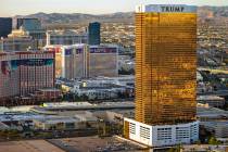 The Trump International, right, is seen with other properties on the Las Vegas Strip during an ...