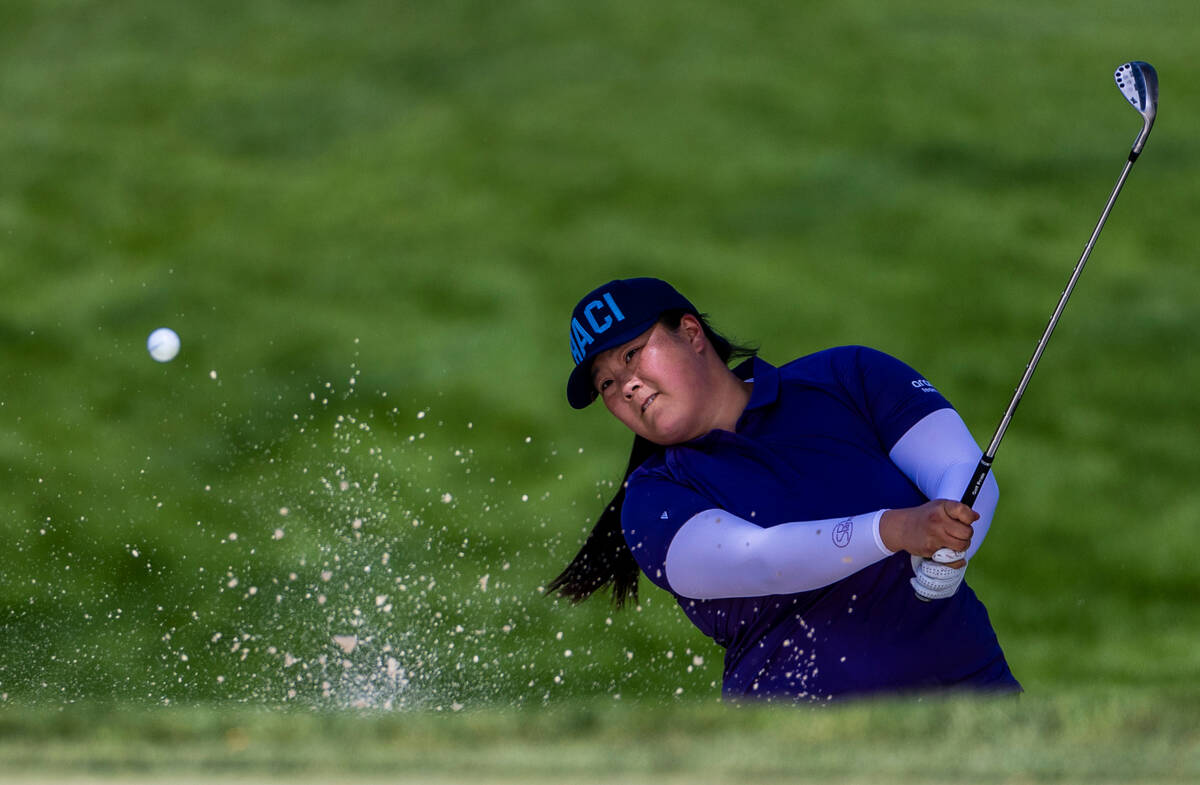 Angel Yin digs out of a sand trap on hole #2 during the third day of the LPGA T-Mobile Match Pl ...