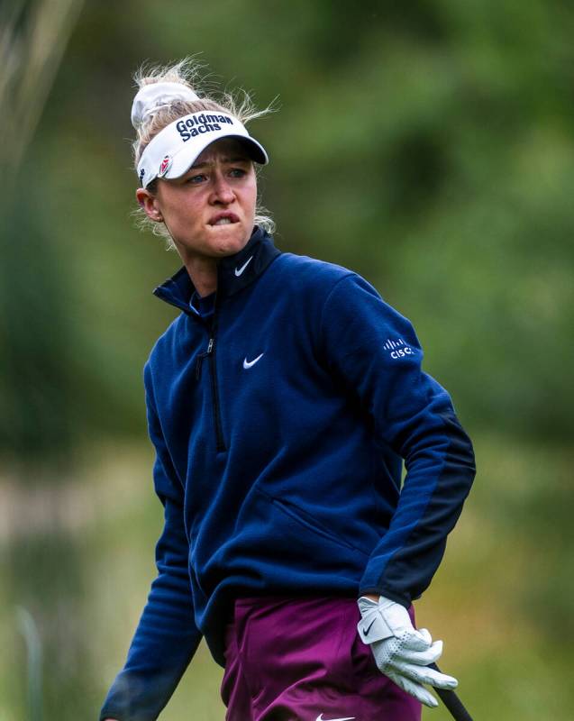 Nelly Korda reacts to an errant drive off the tee at hole #14 during the third day of the LPGA ...