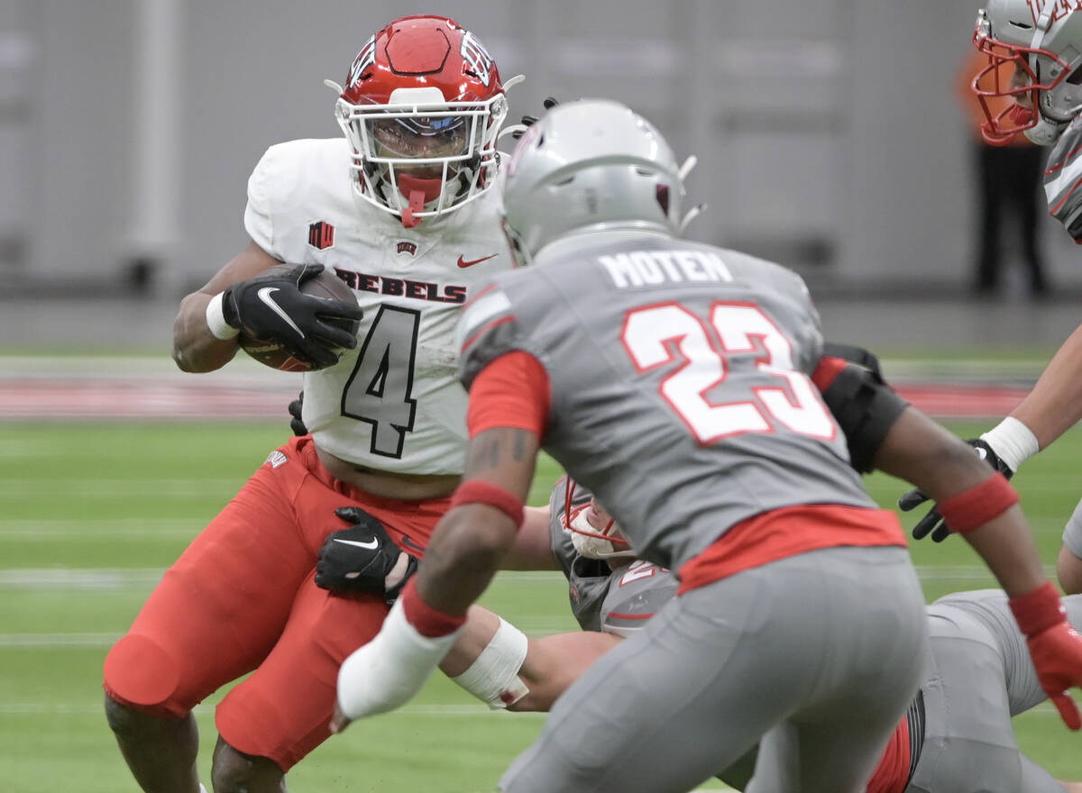 UNLV running back Michael Allen looks for an opening during UNLV football’s Spring Showc ...