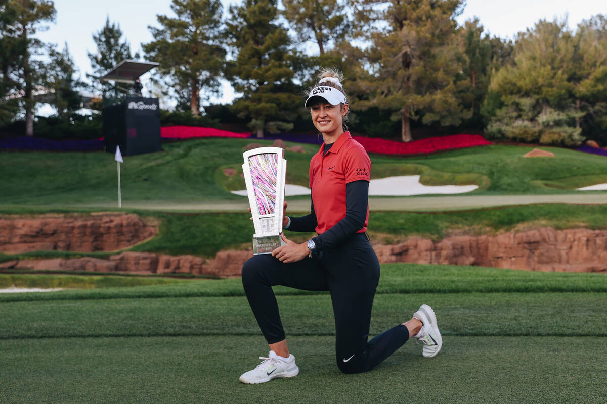 Nelly Korda poses with a trophy during the T-Mobile Match Play championship match at Shadow Cre ...