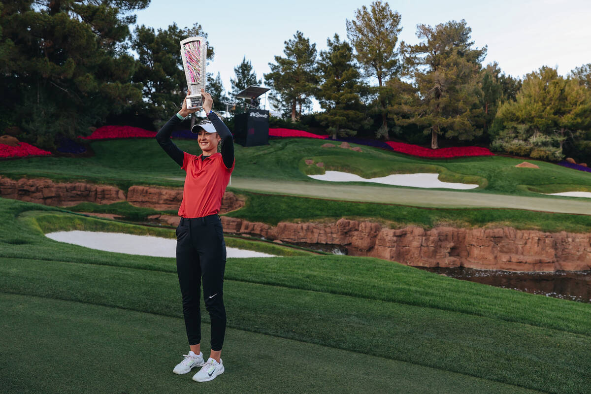 Nelly Korda poses with a trophy during the T-Mobile Match Play championship match at Shadow Cre ...