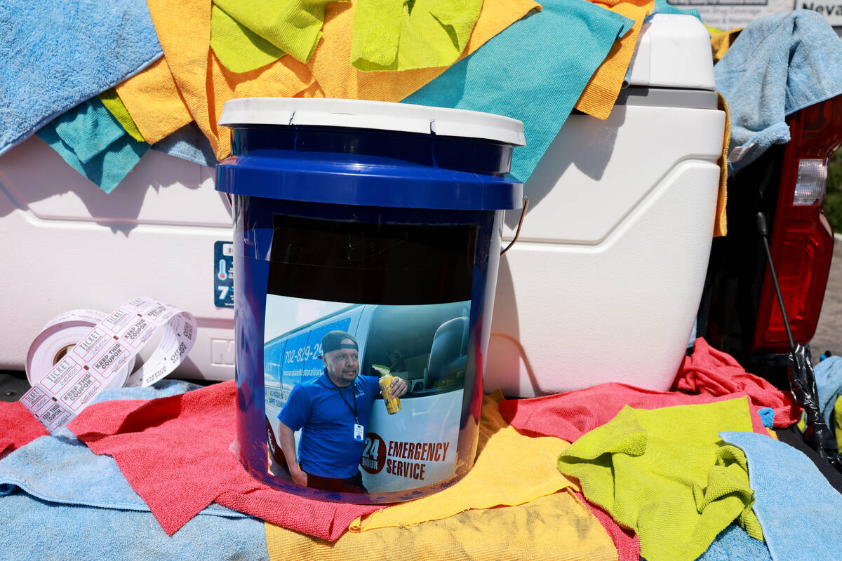 A donation bucket is shown during a fundraiser for the family of Raul Cardoza at an East Las Ve ...