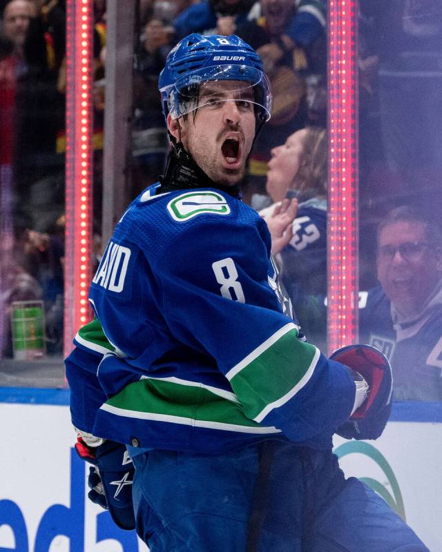 Vancouver Canucks' Conor Garland (8) celebrates after scoring against the Vegas Golden Knights ...