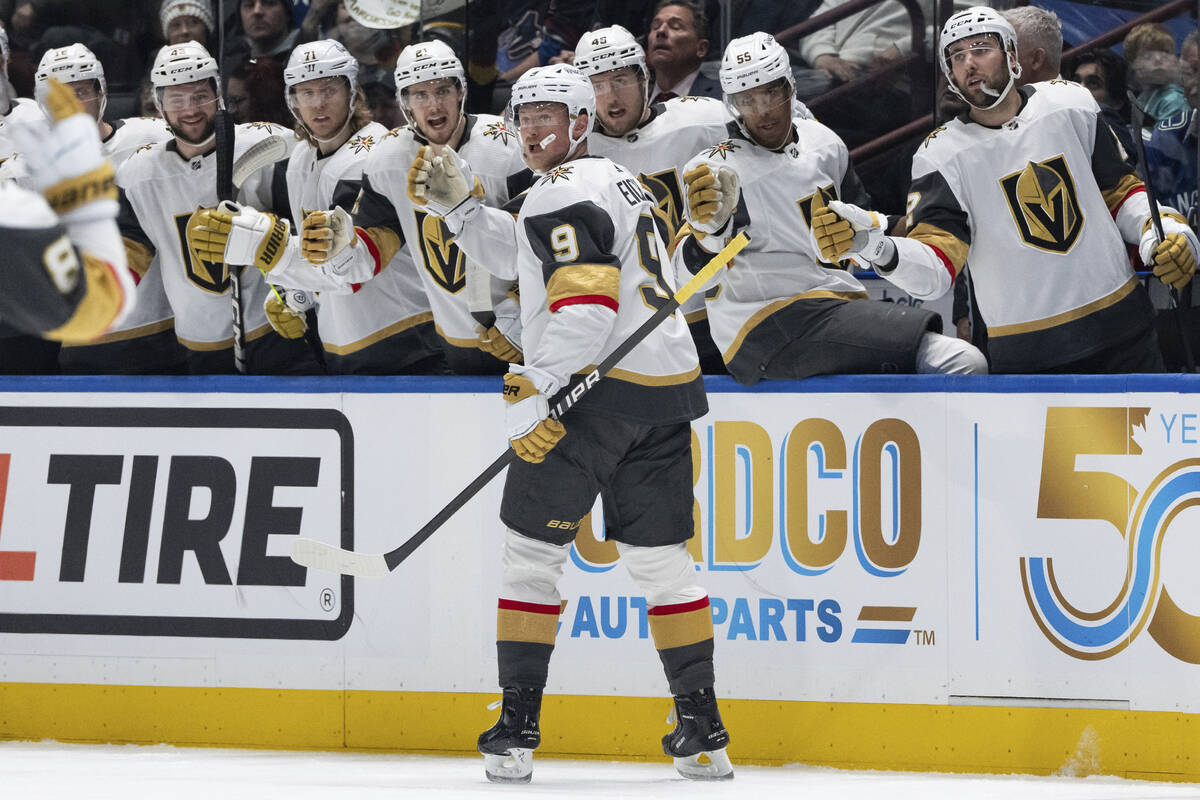Vegas Golden Knights' Jack Eichel (9) celebrates with his teammates after his goal against the ...