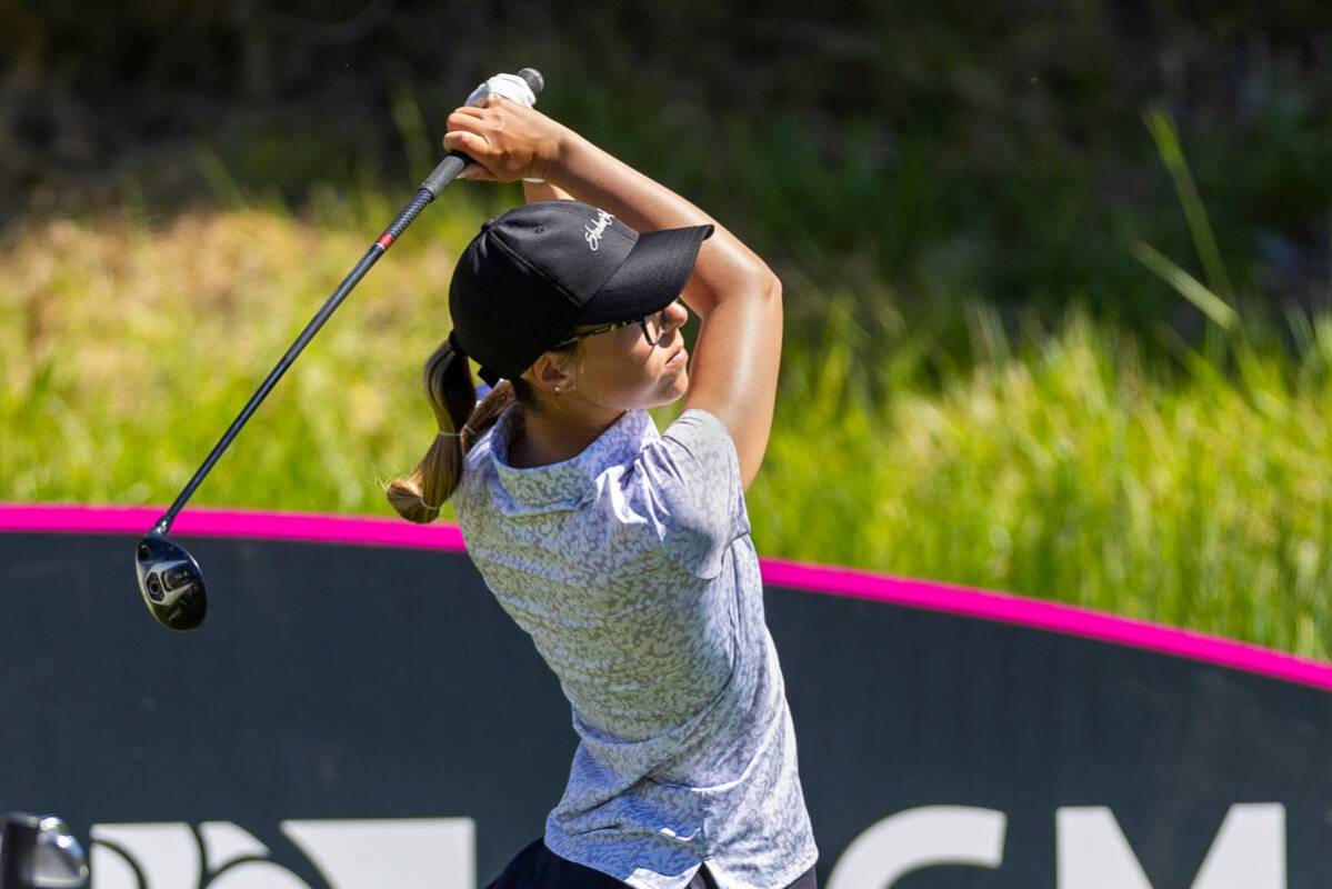 McKenzi Hall of UNLV watches the ball from the 13th tee during the first day of the LPGA T-Mobi ...