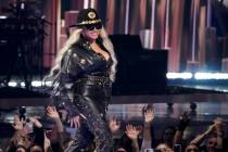 Beyonce walks onstage to accept the Innovator Award during the iHeartRadio Music Awards, Monday ...