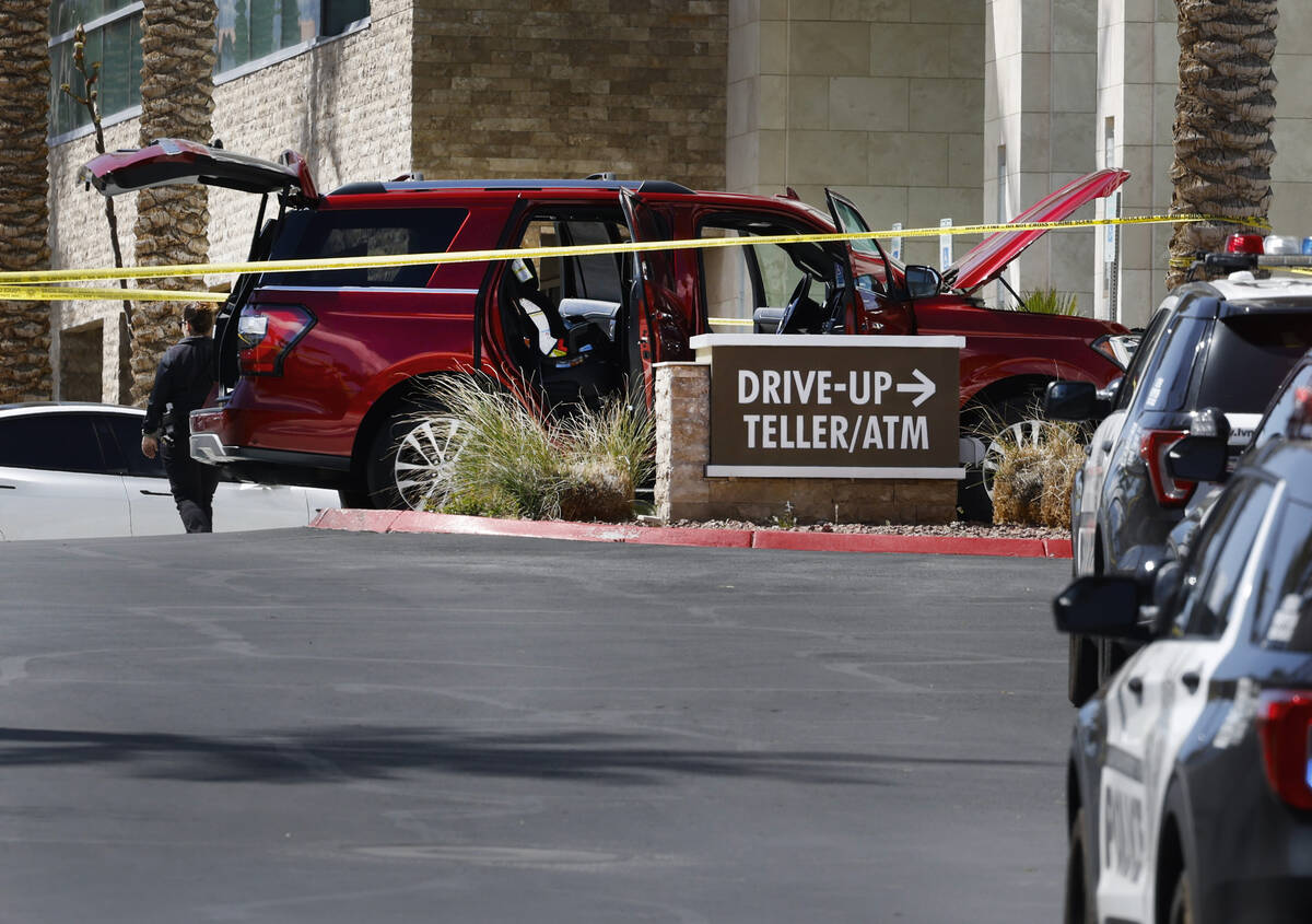 Las Vegas police investigate a shooting at City National Bank Building on Monday, April 8, 2024 ...
