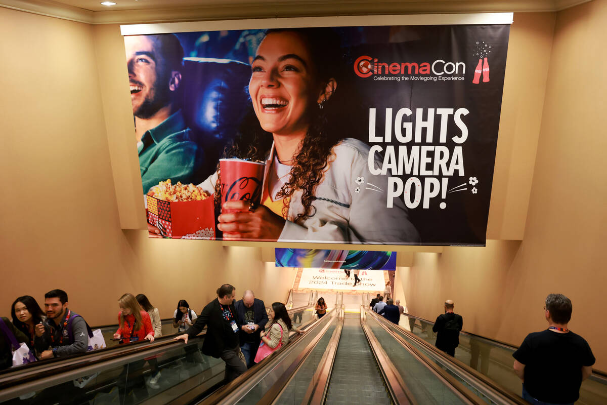 Conventioneers attend the CinemaCon trade show at Caesars convention center in Las Vegas Tuesda ...