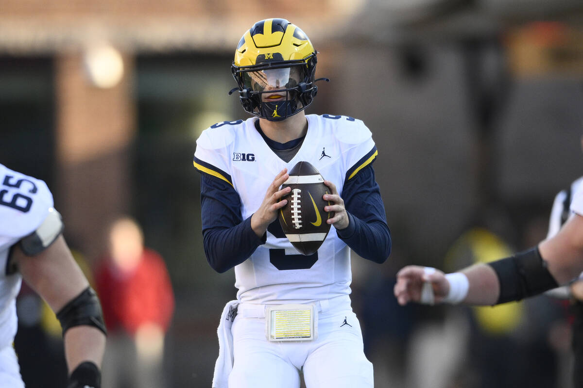 Michigan quarterback J.J. McCarthy (9) in action during the second half of an NCAA college foot ...