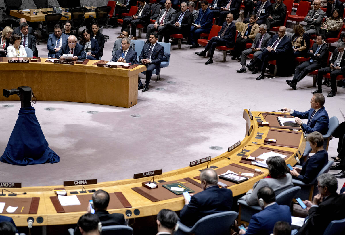 Palestinian Ambassador to the United Nations Riyad Mansour, top left, addresses United Nations ...