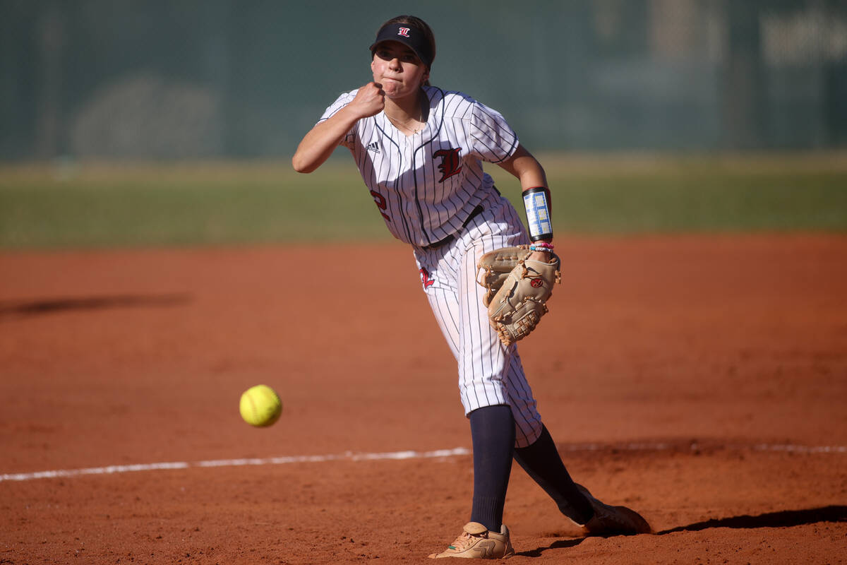 Liberty's Dani Diaz (12) throws to Coronado during a high school softball game on Tuesday, Apri ...