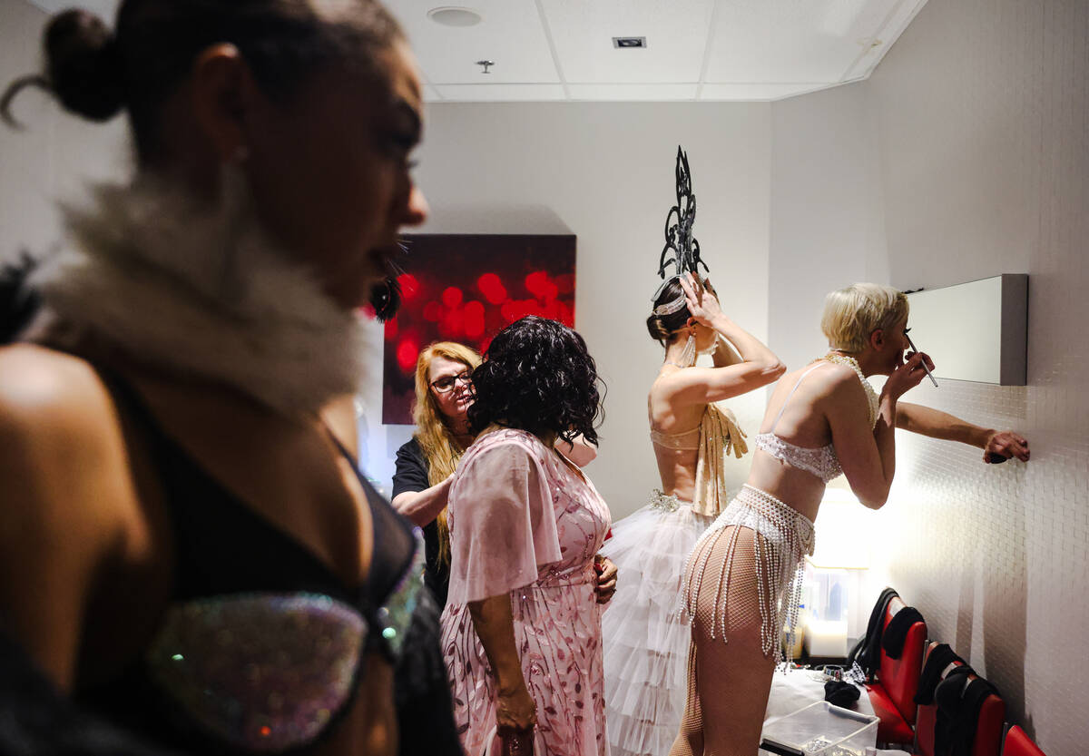 Dancers who play ghost showgirls get ready in the backroom before dress rehearsal for FOLLIES, ...