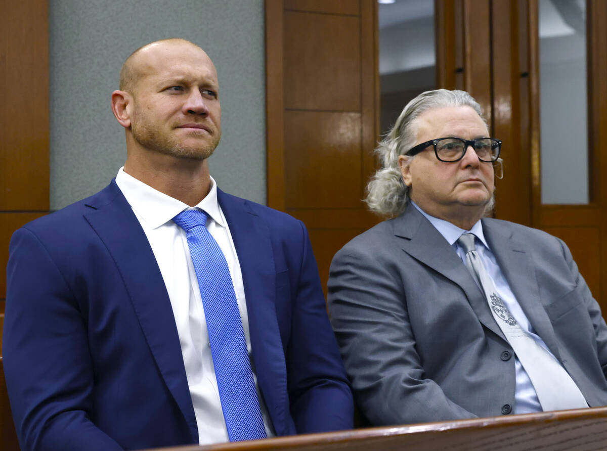 Daniel Rodimer, left, appears in court with his attorney David Chesnoff during his initial appe ...