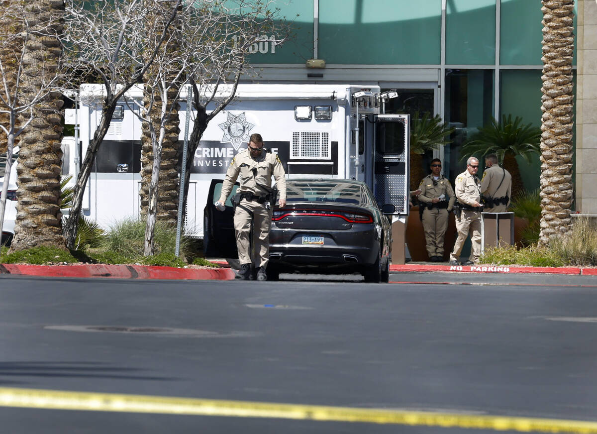 Las Vegas police investigate a shooting at City National Bank Building on Monday, April 8, 2024 ...