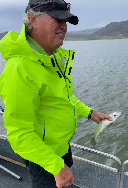 Joseph Houston II holds a fish he caught on a boat at Panguitch Lake in Utah in 2022. (Austin S ...