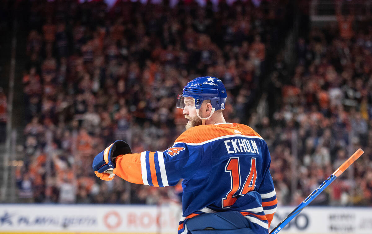 Edmonton Oilers' Mattias Ekholm (14) celebrates a goal against the Vegas Golden Knights during ...