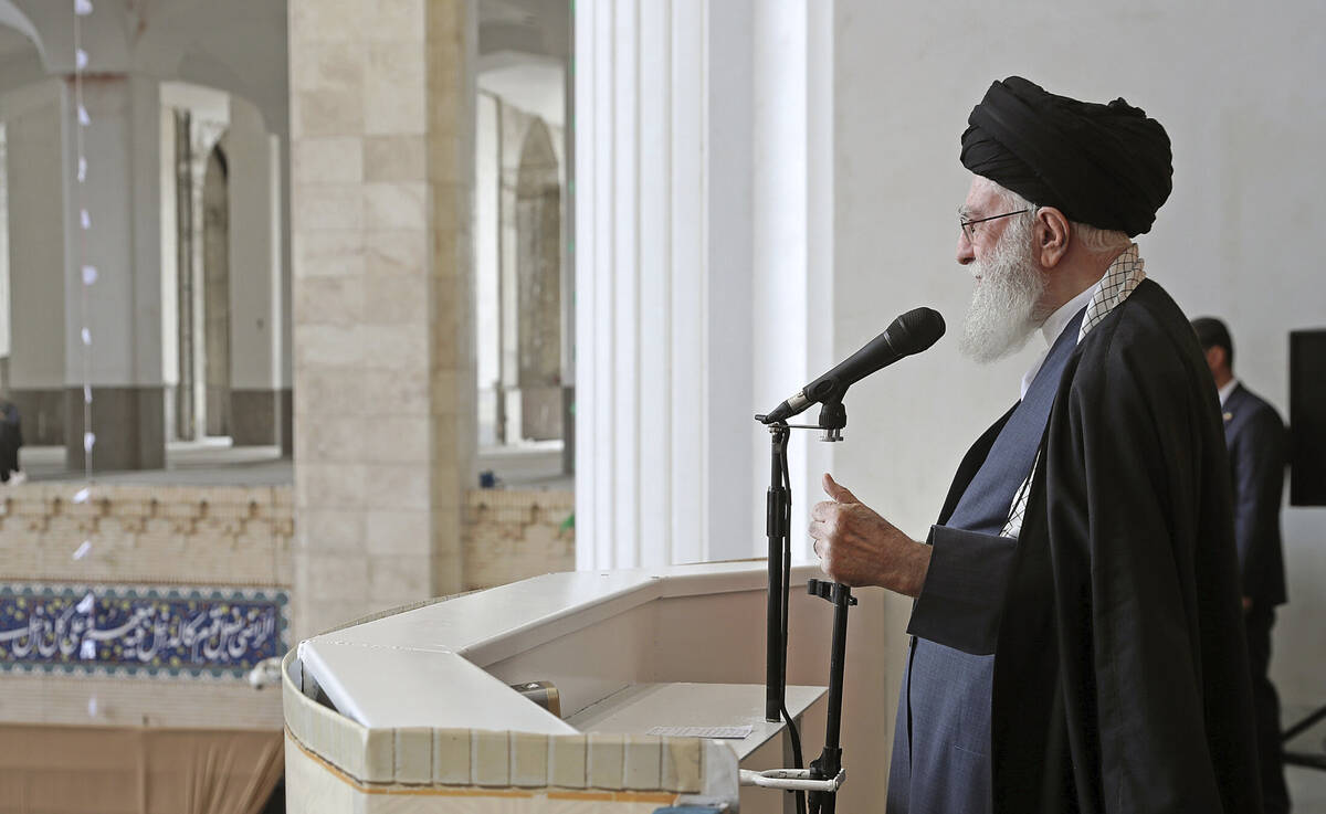 In this photo released by the official website of the office of the Iranian supreme leader, Aya ...