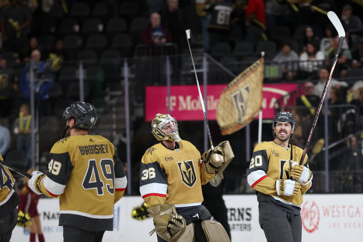 Golden Knights center Ivan Barbashev (49), Golden Knights goaltender Logan Thompson (36) and Go ...