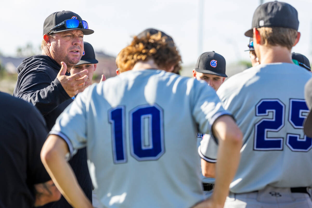 Bishop Gorman coach Chris Sheff counsels his players after beating Centennial 4-3 at Centennial ...