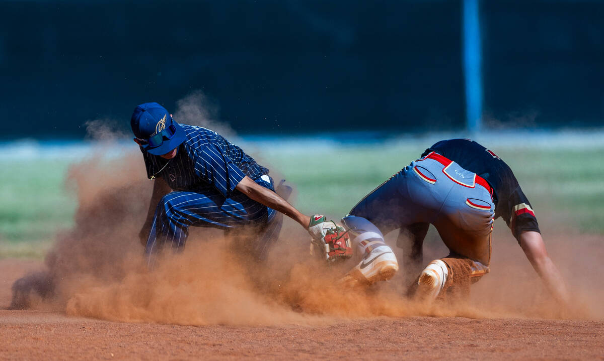 Tech runner Nathan Johnson arrives safely at second base beating the tag by Cheyenne infielder ...