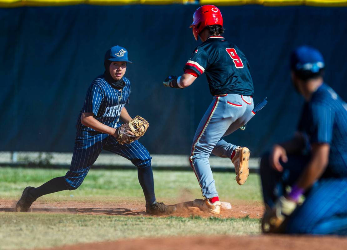 Cheyenne infielder Raider Campos tags first base just for an out ahead of Tech runner Nick Coll ...