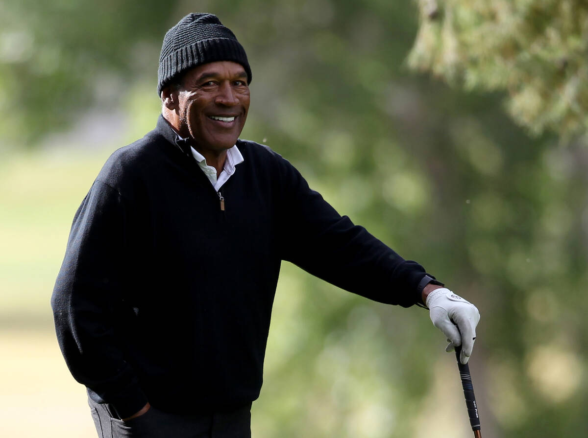 O.J. Simpson prepares to tee off on the seventh hole at Las Vegas National Golf Club Wednesday, ...