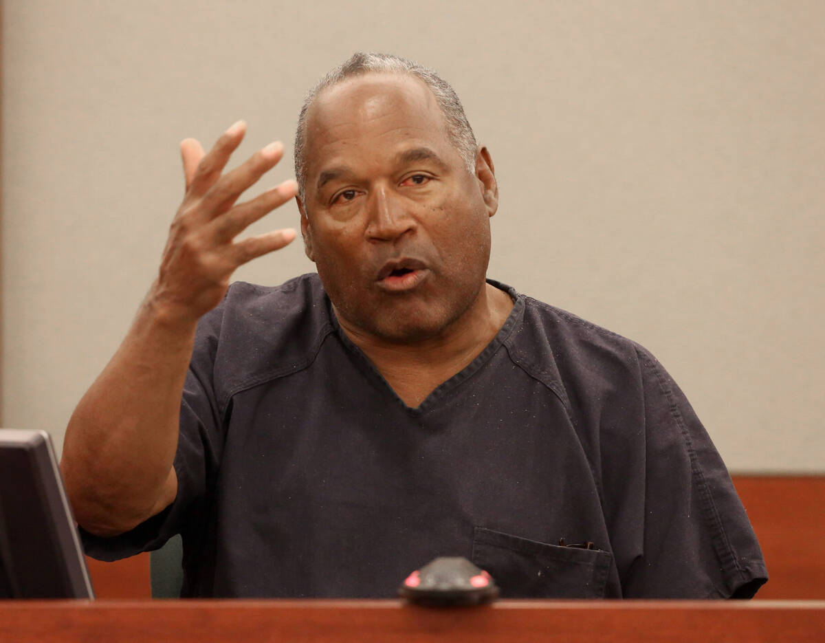 O.J. Simpson testifies during his evidentiary hearing in Clark County District Court on May 15, ...