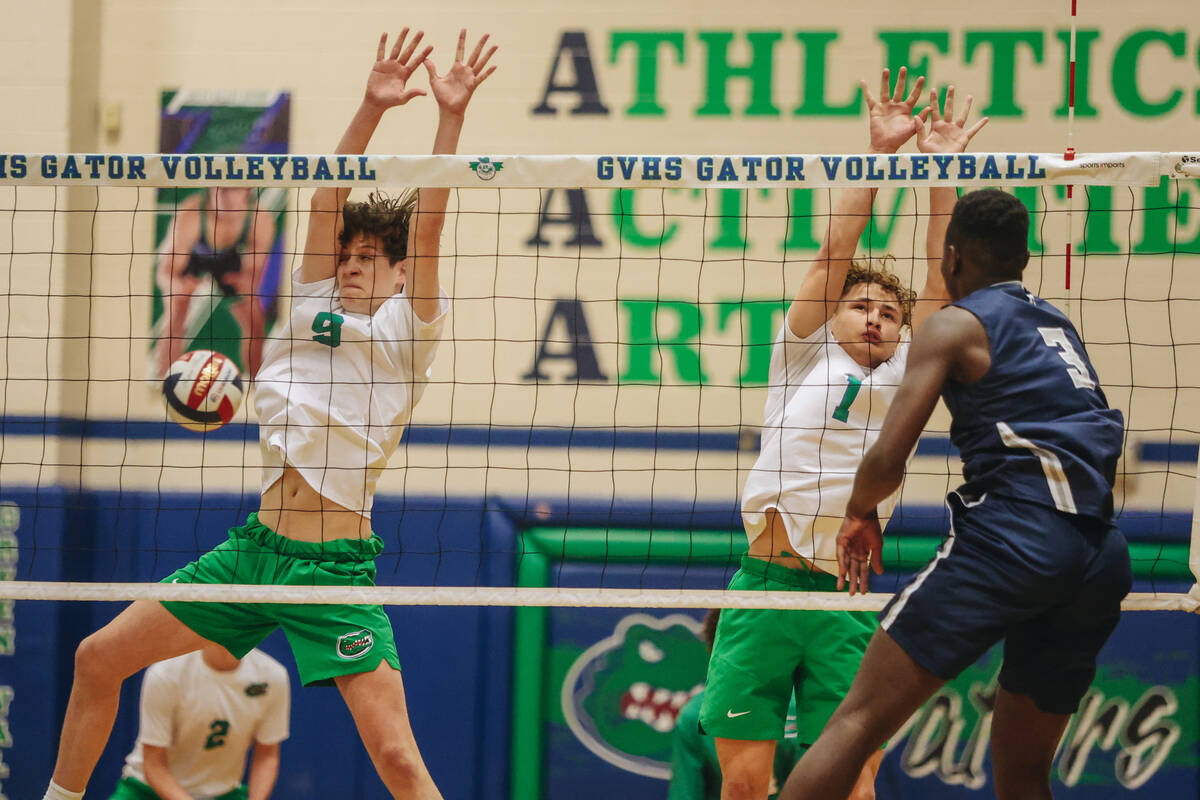 Green Valley teammates Taylor Beck (1) and Brady Barney (9) fail to lodge the ball back on Shad ...