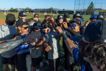 Basic players come together after a dominating win over Spring Valley in their first NIAA baseb ...