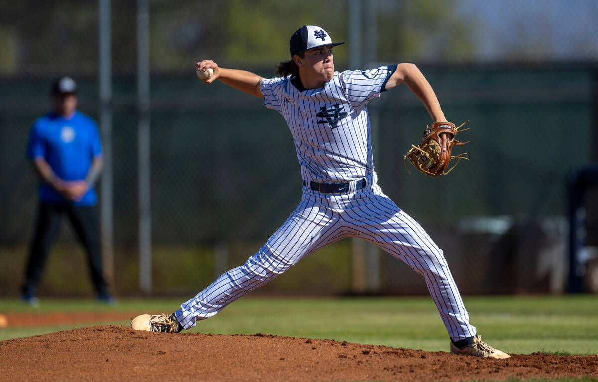 Spring Valley pitcher Victor Quinonez winds up to face another Basic batter during the second i ...