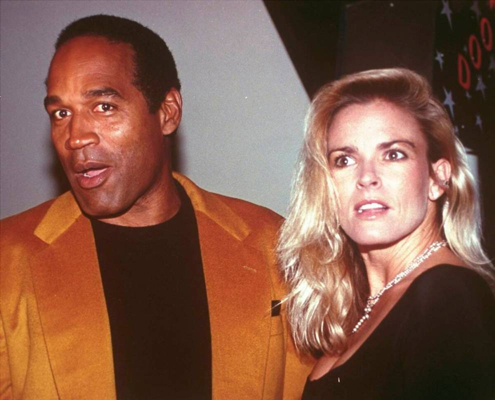 O.J. Simpson and his wife, Nicole Brown Simpson, arrive for the opening of the Harley-Davidson ...